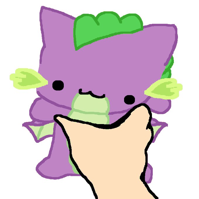 Purple dragon kitten squeezed by a hand